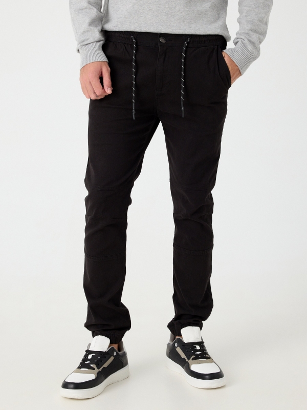 Knotted jogger pants black middle front view