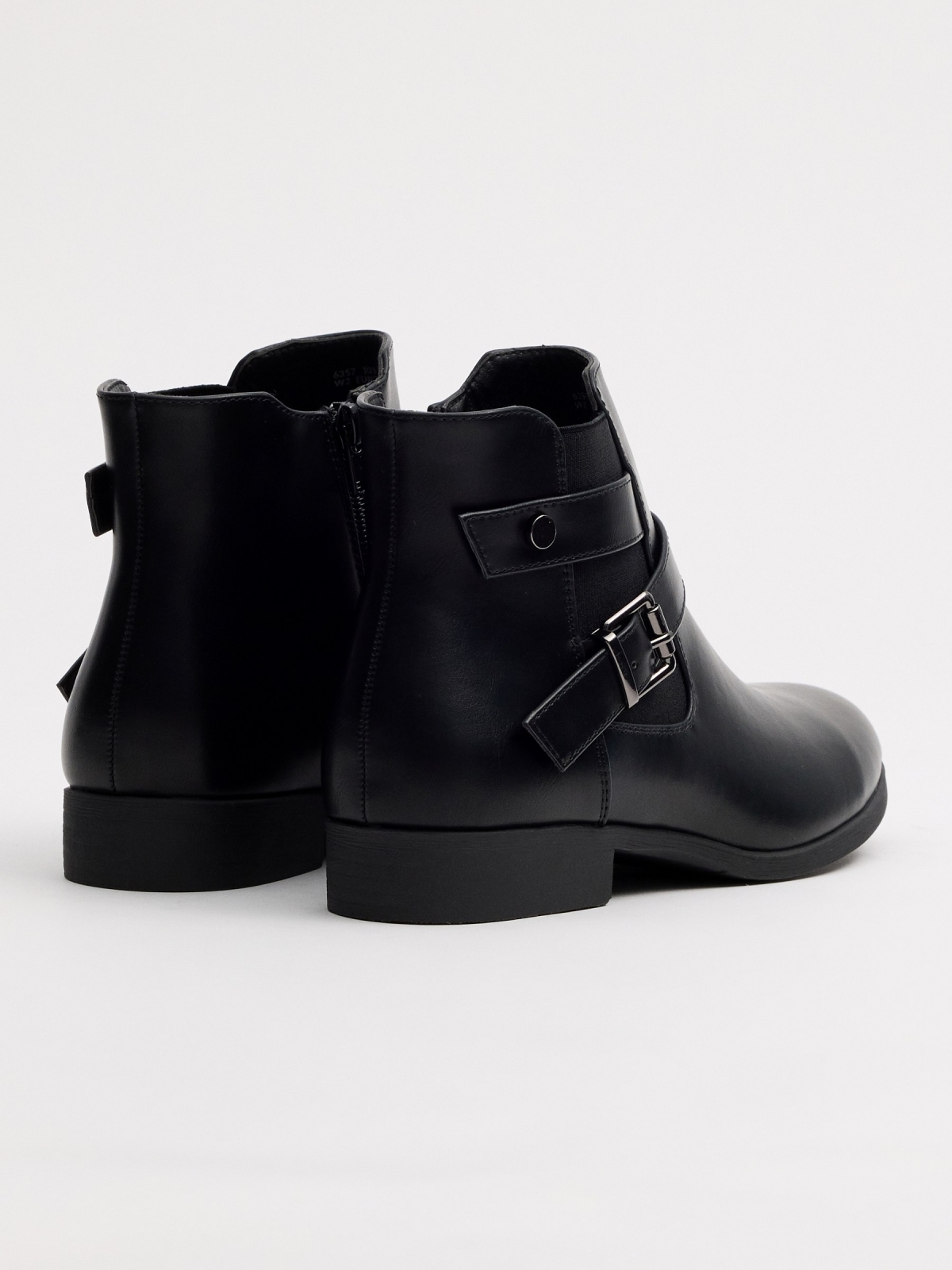 Classic elastic ankle boot with crossed buckles 45º back view