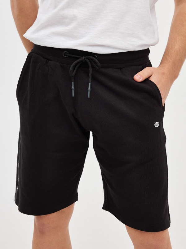 Bermudas Jogger Shorts preto preto primeiro plano