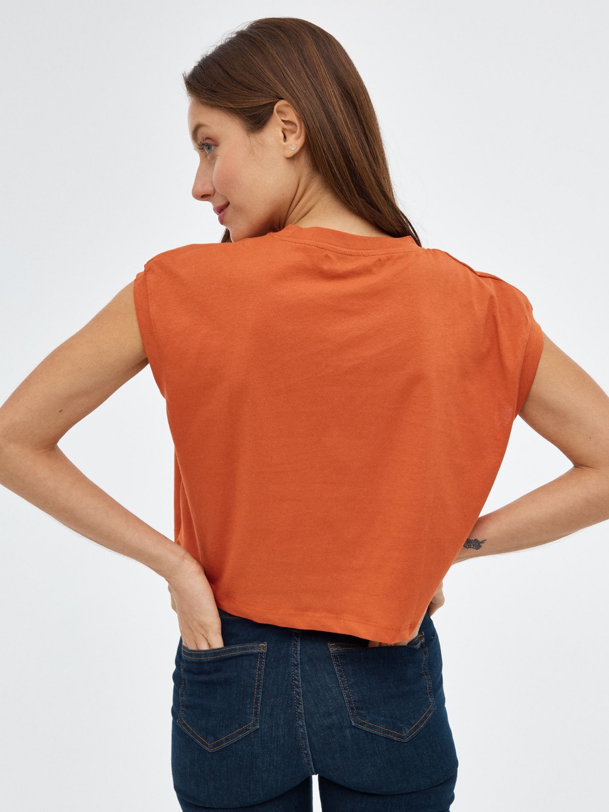 Orange graphic T-shirt brick red middle back view