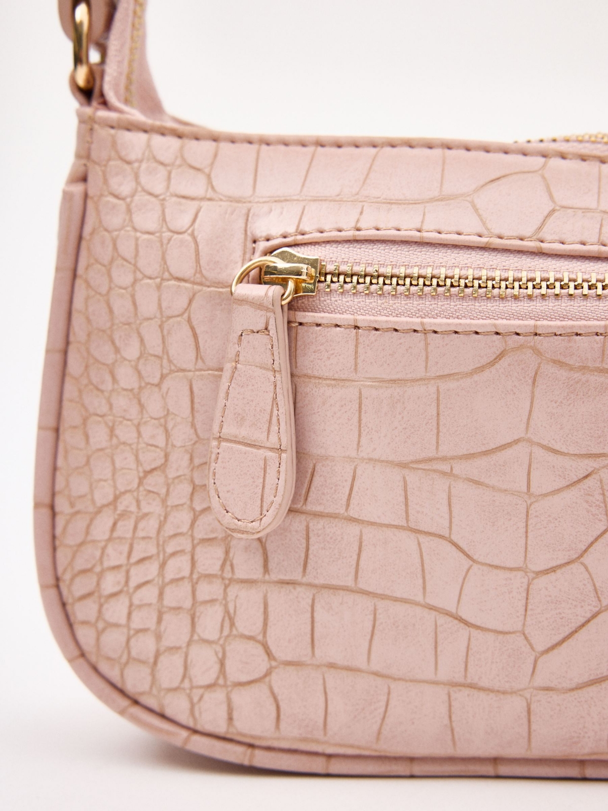 Pale pink leather effect bag pink detail view