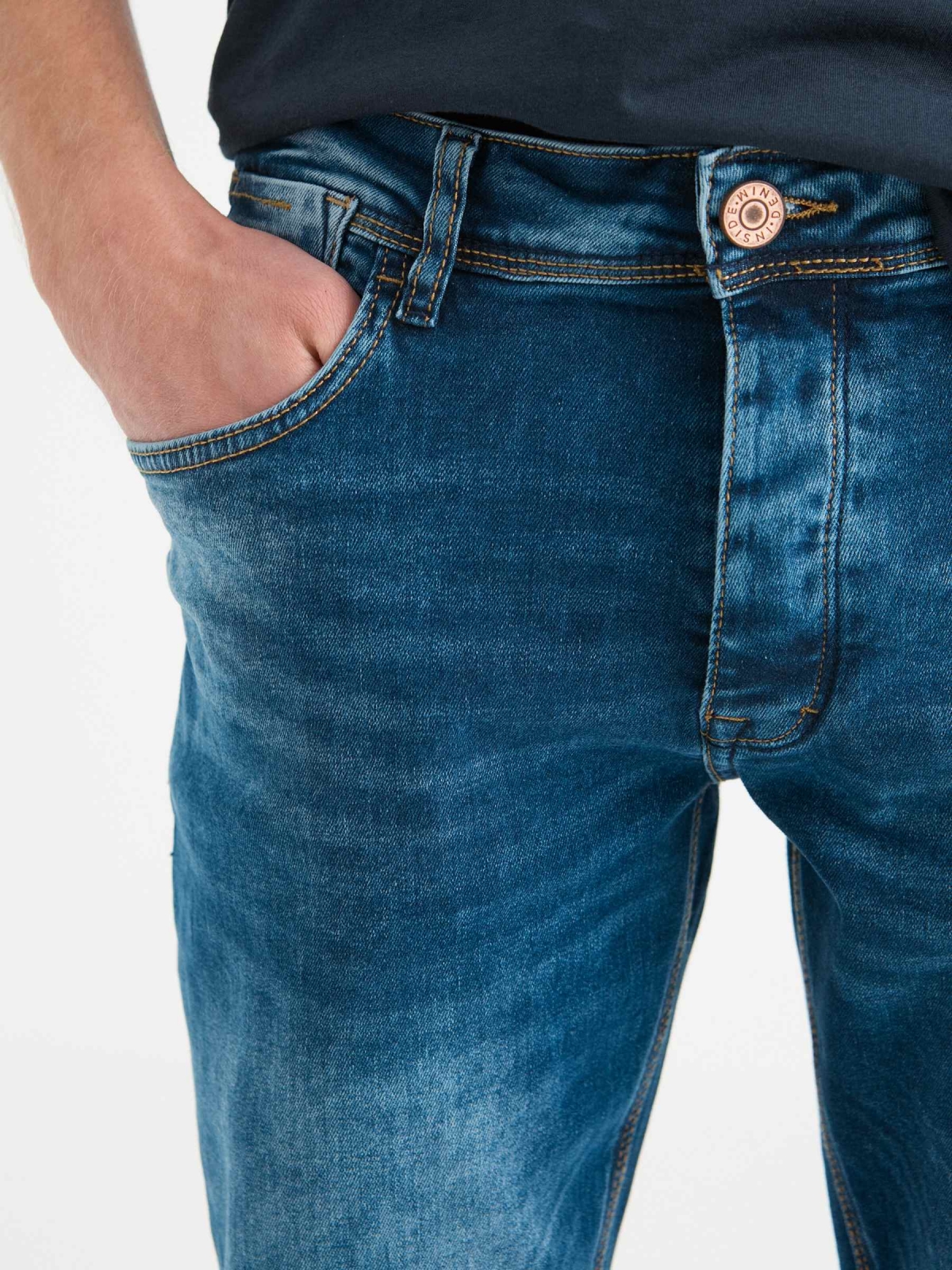 Regular washed blue jeans dark blue detail view