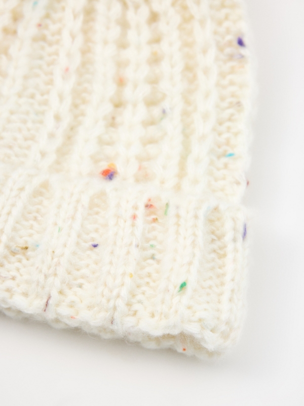 Multicolored mottled white cap white detail view