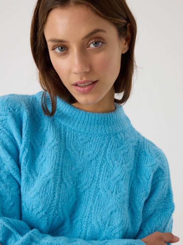 Knitted sweater round neck turquoise detail view