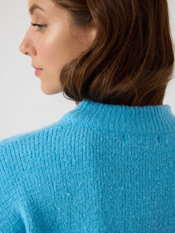 Knitted sweater round neck turquoise detail view