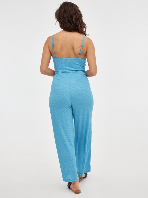 Black jumpsuit with crossover neckline blue middle back view