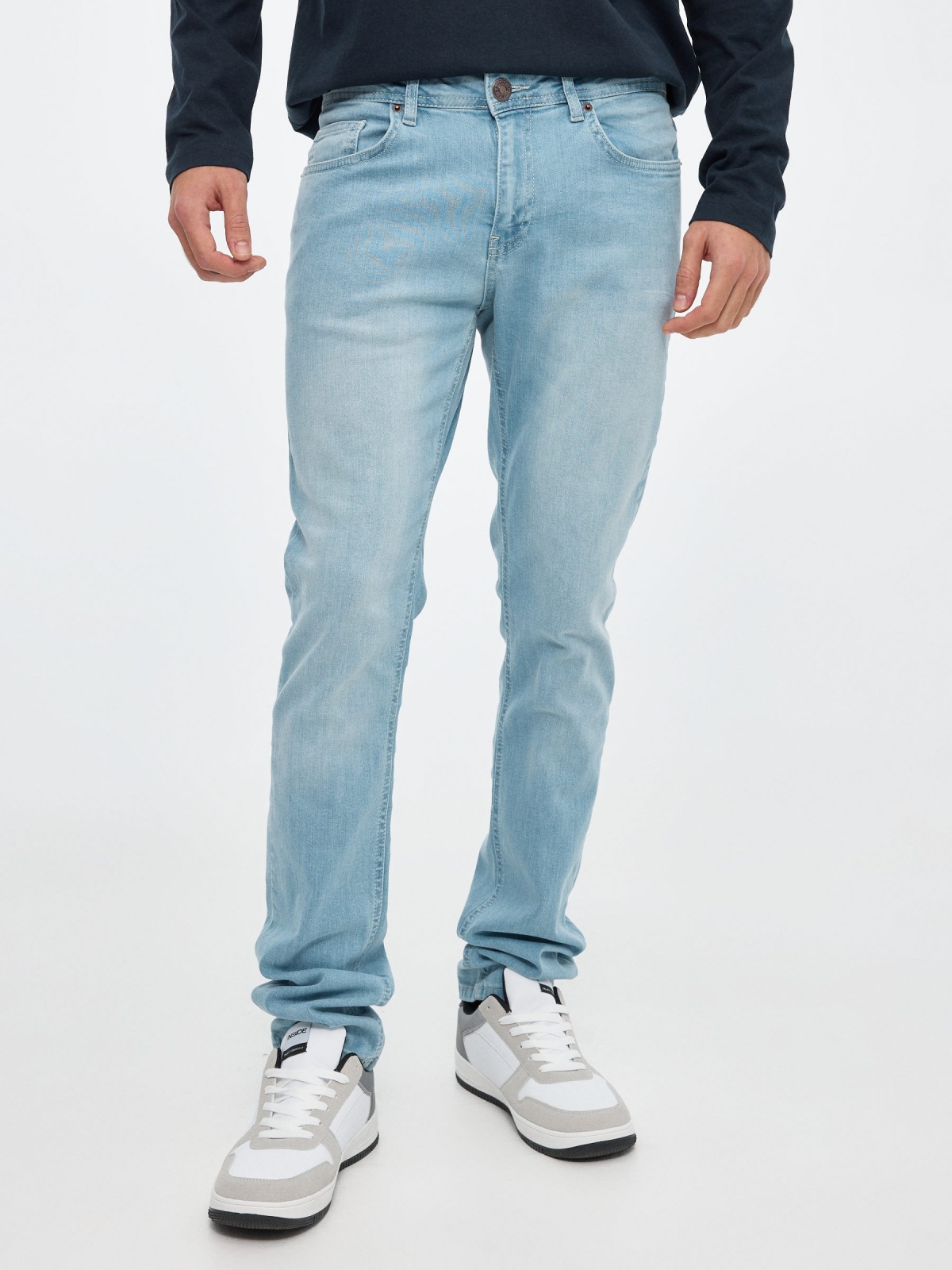 Light blue slim jeans dark blue middle front view