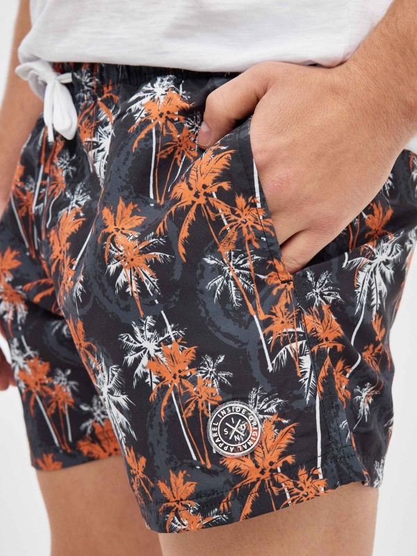 Palm tree print swimsuit black detail view