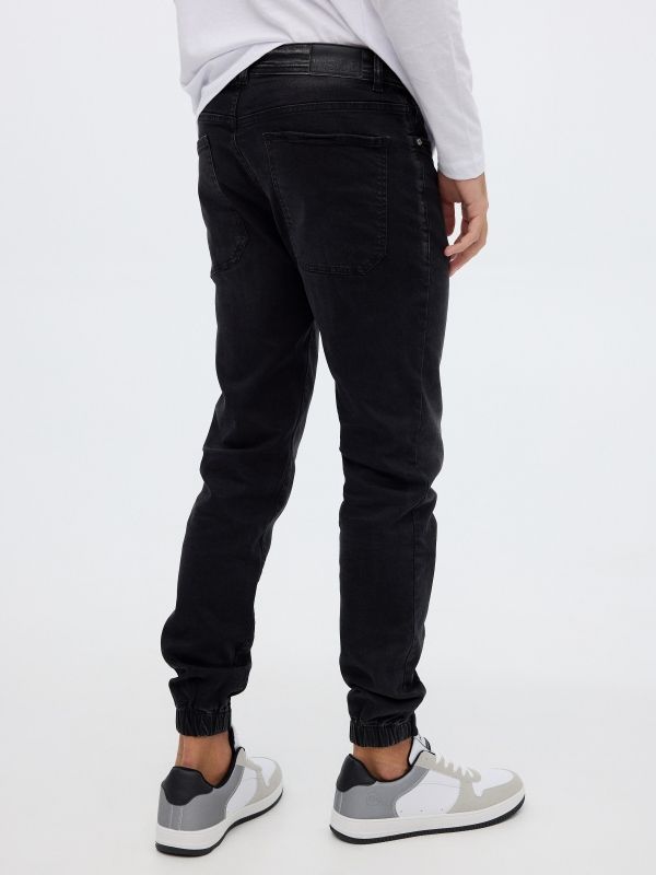 Denim jogger trousers black middle back view