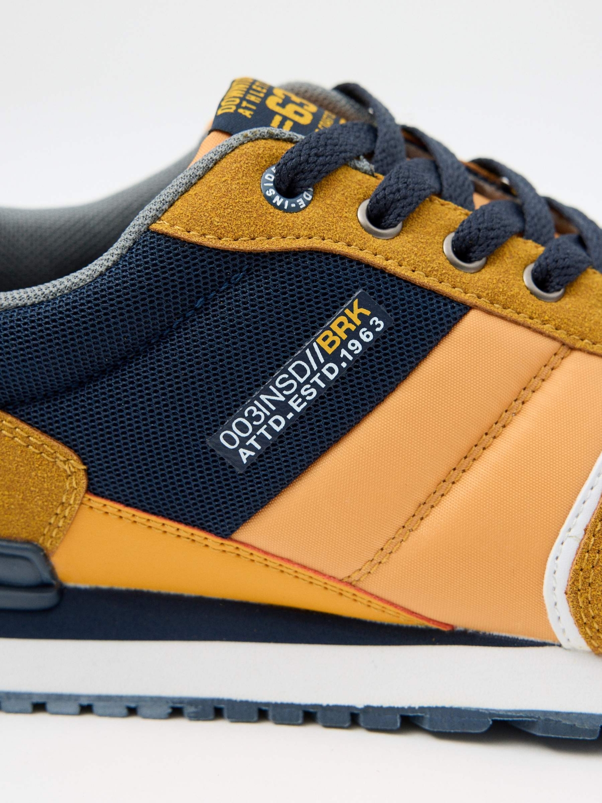 Combined casual sneaker mustard detail view