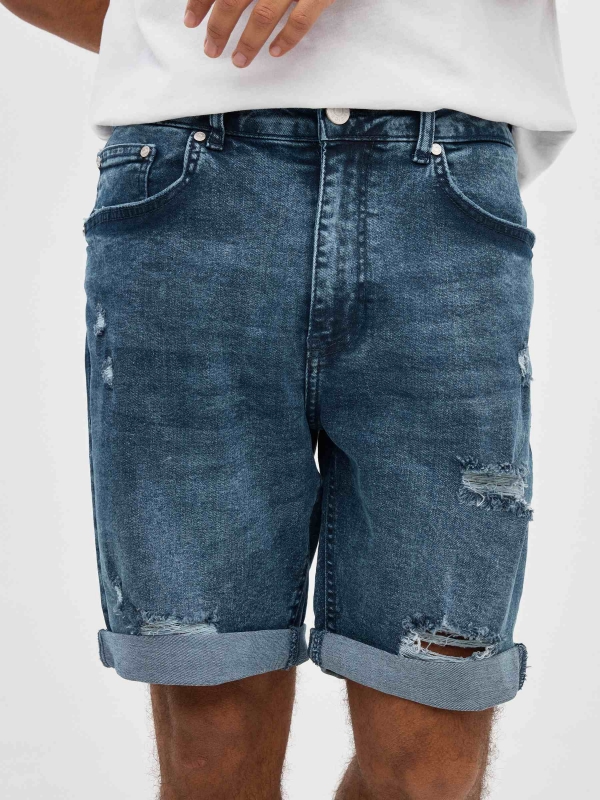 Ripped slim denim Bermuda shorts blue detail view