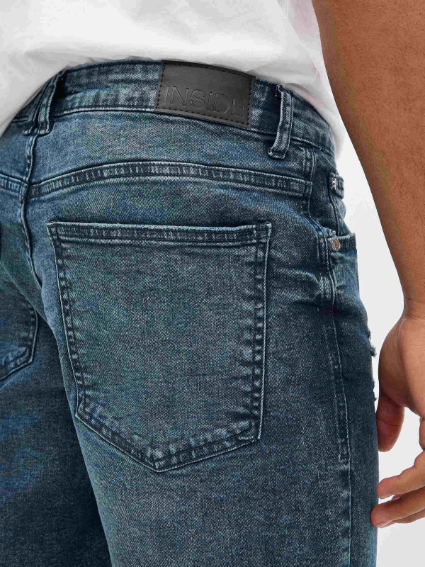 Ripped slim denim Bermuda shorts blue detail view