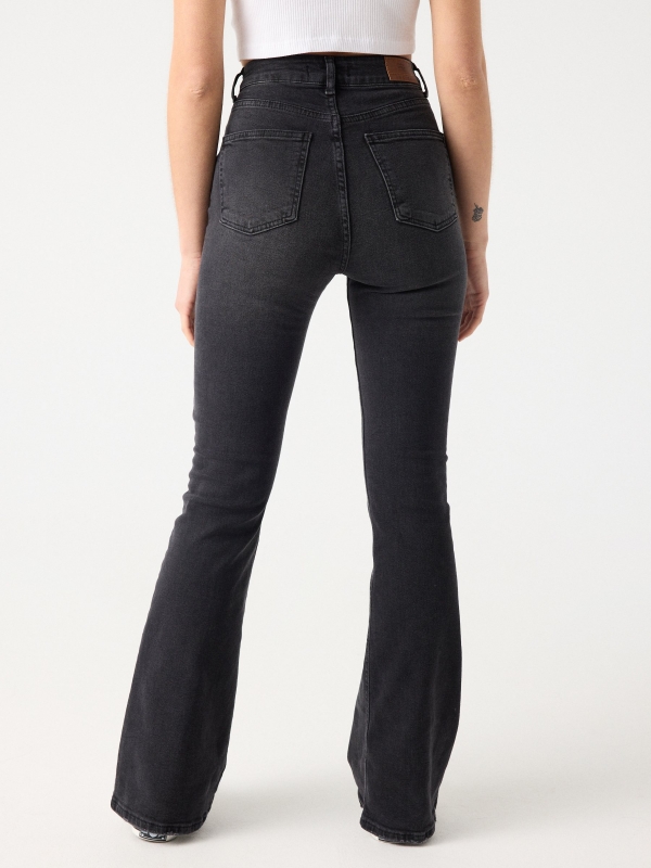 High waist black flared jeans black middle back view
