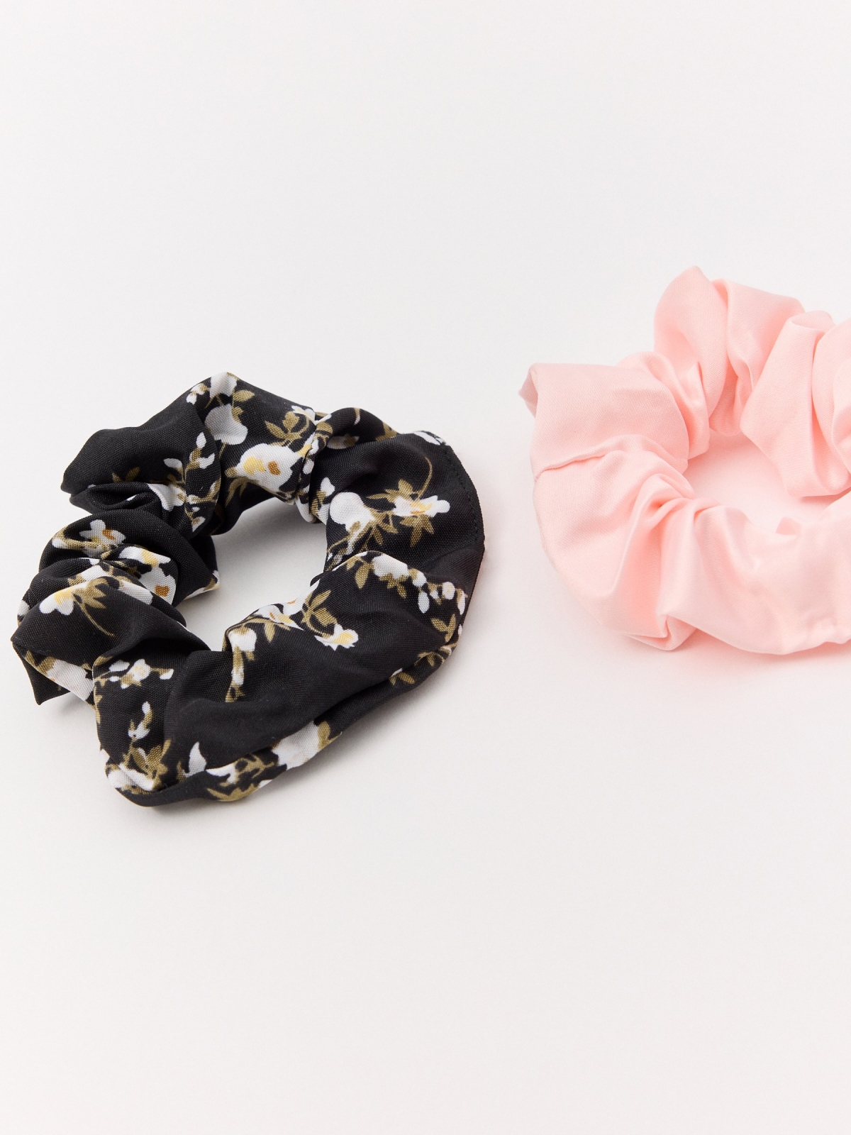 3 pcs. pack of scrunchies foreground with a model