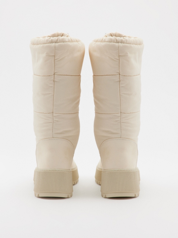 White padded boots beige zenithal view