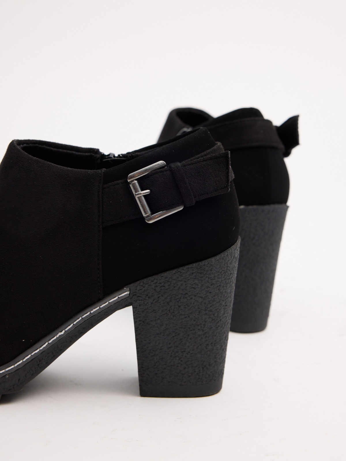Black low ankle boots with buckle black detail view