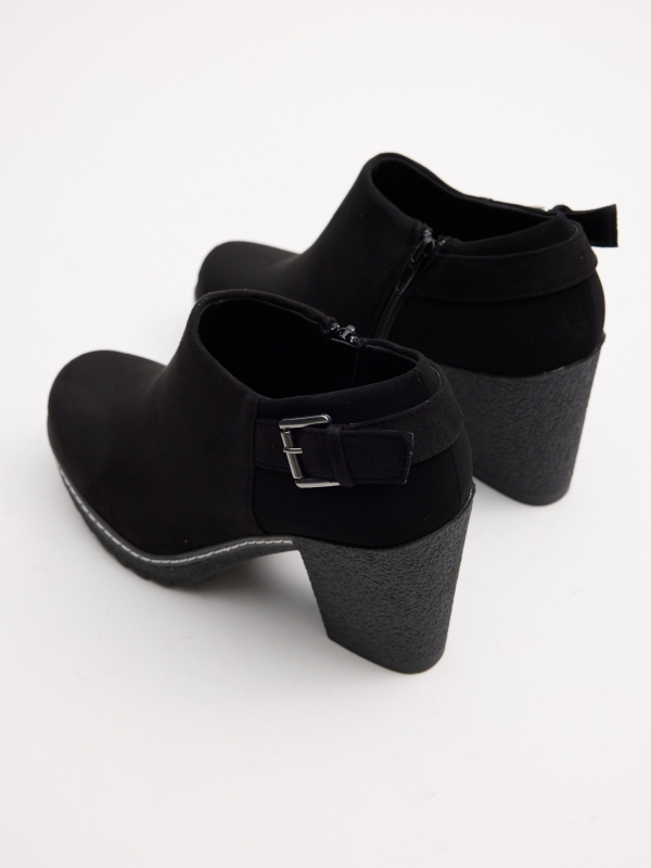 Black low ankle boots with buckle black detail view