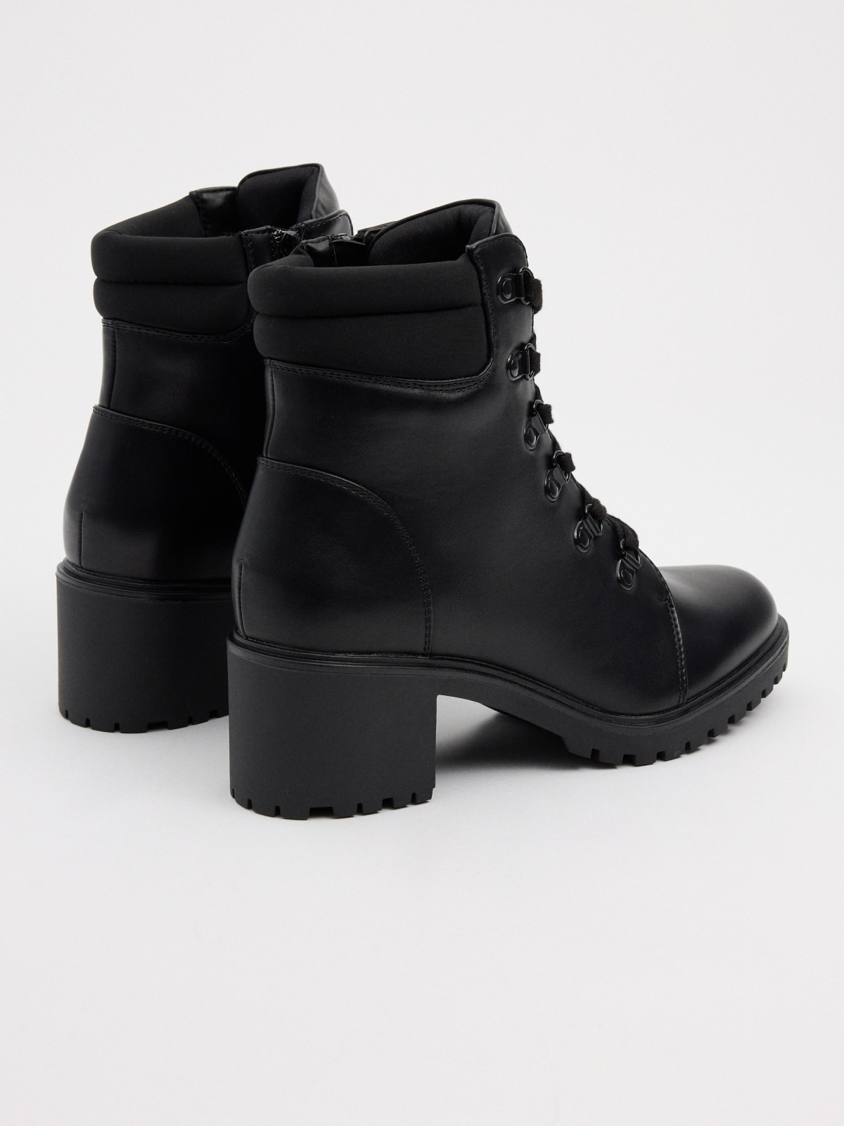 Black ankle boot with lace-up heel black 45º back view