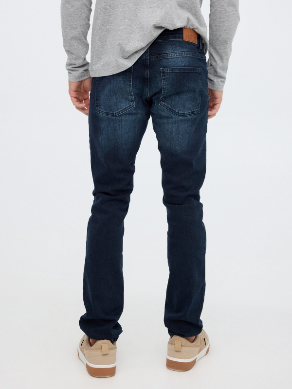 Regular jeans dark blue middle back view