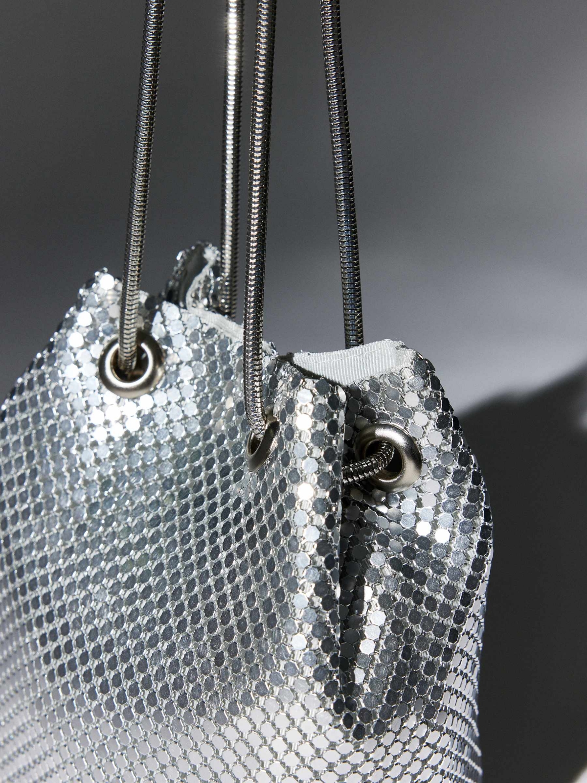 Metallic bucket bag silver detail view
