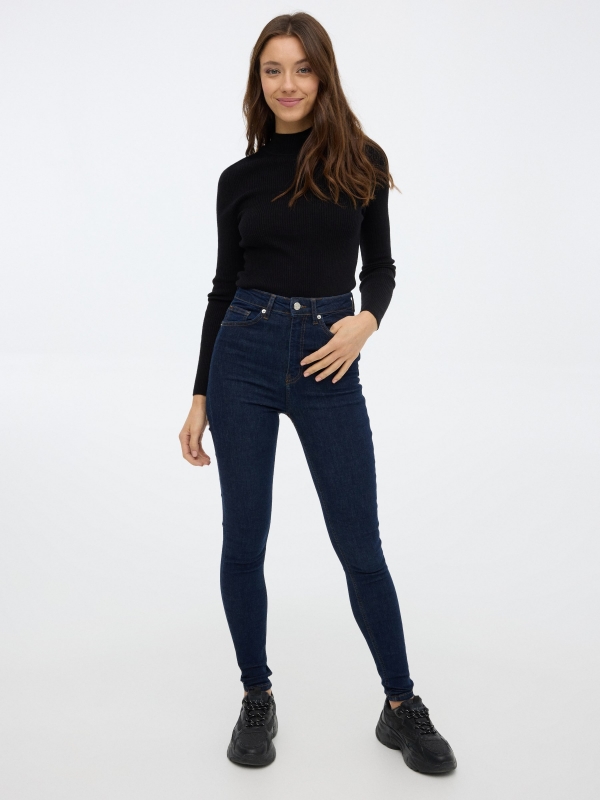 High rise skinny jeans dark blue front view