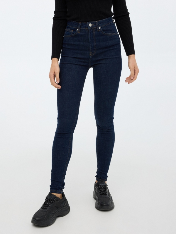 High rise skinny jeans dark blue middle front view