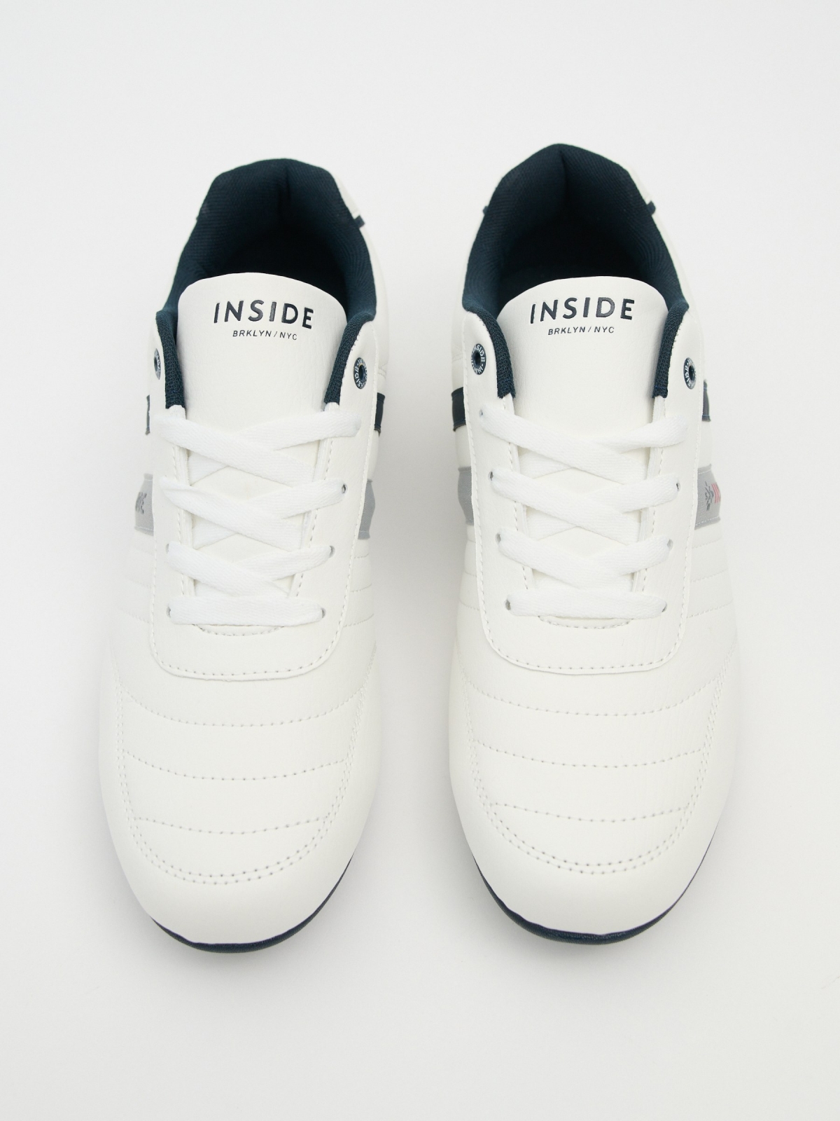 Leather effect sneaker with seams white zenithal view