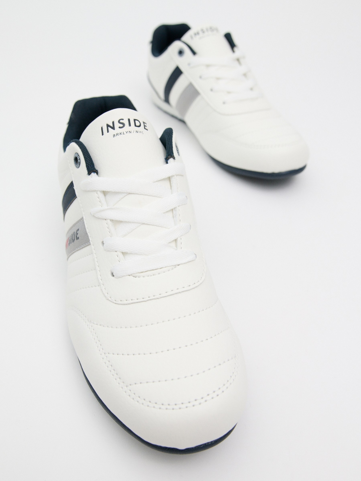 Leather effect sneaker with seams white