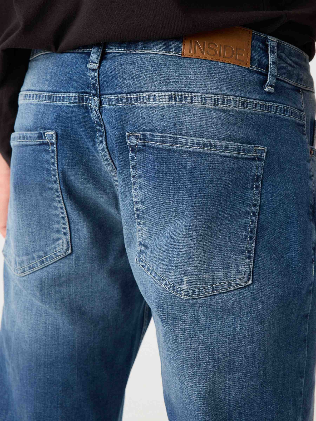 Regular washed blue jeans blue detail view