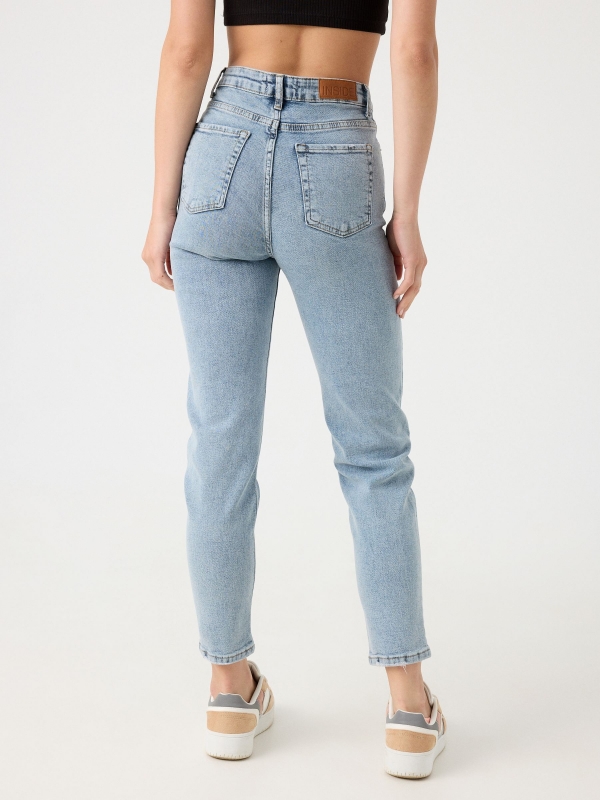 Slim-fit mom jeans with washed effect light blue middle back view