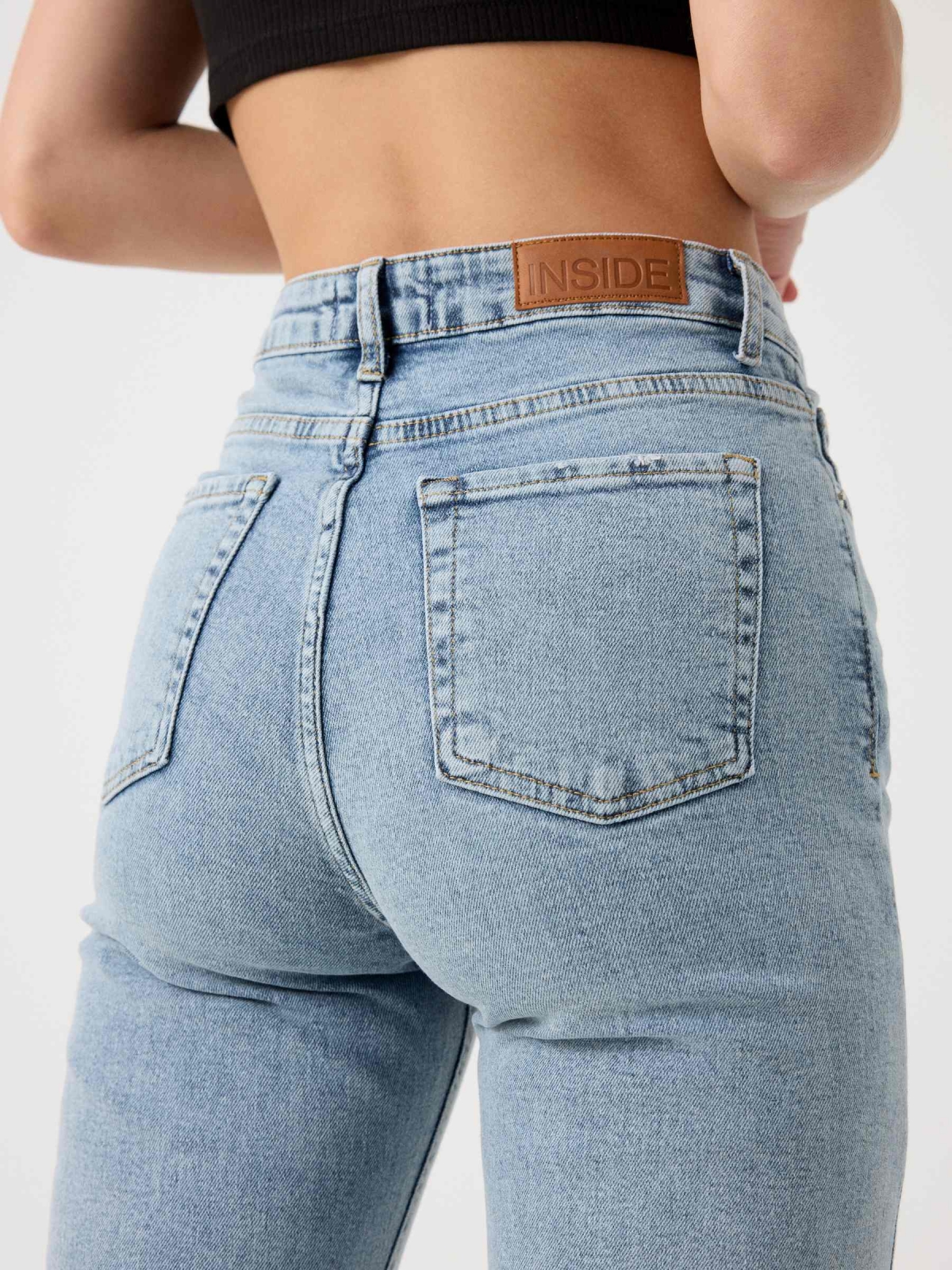 Slim-fit mom jeans with washed effect light blue detail view