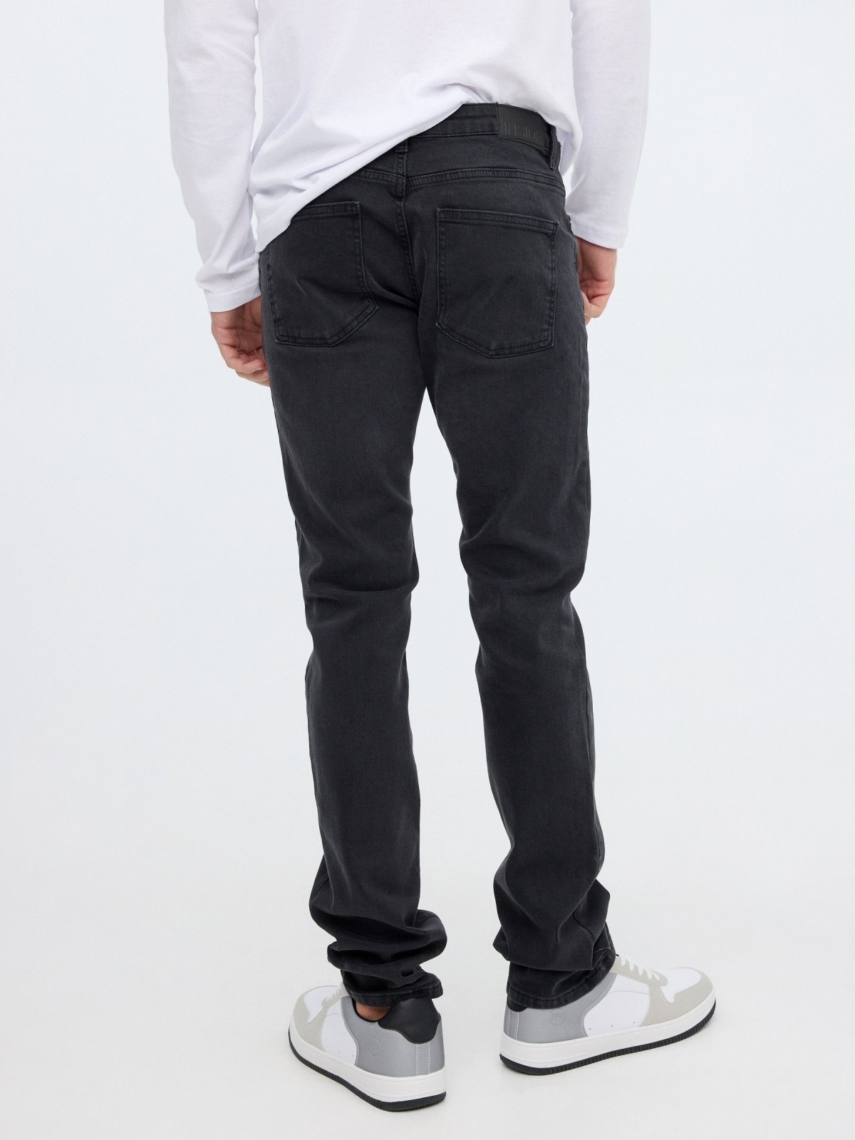 Regular jeans dark grey middle back view