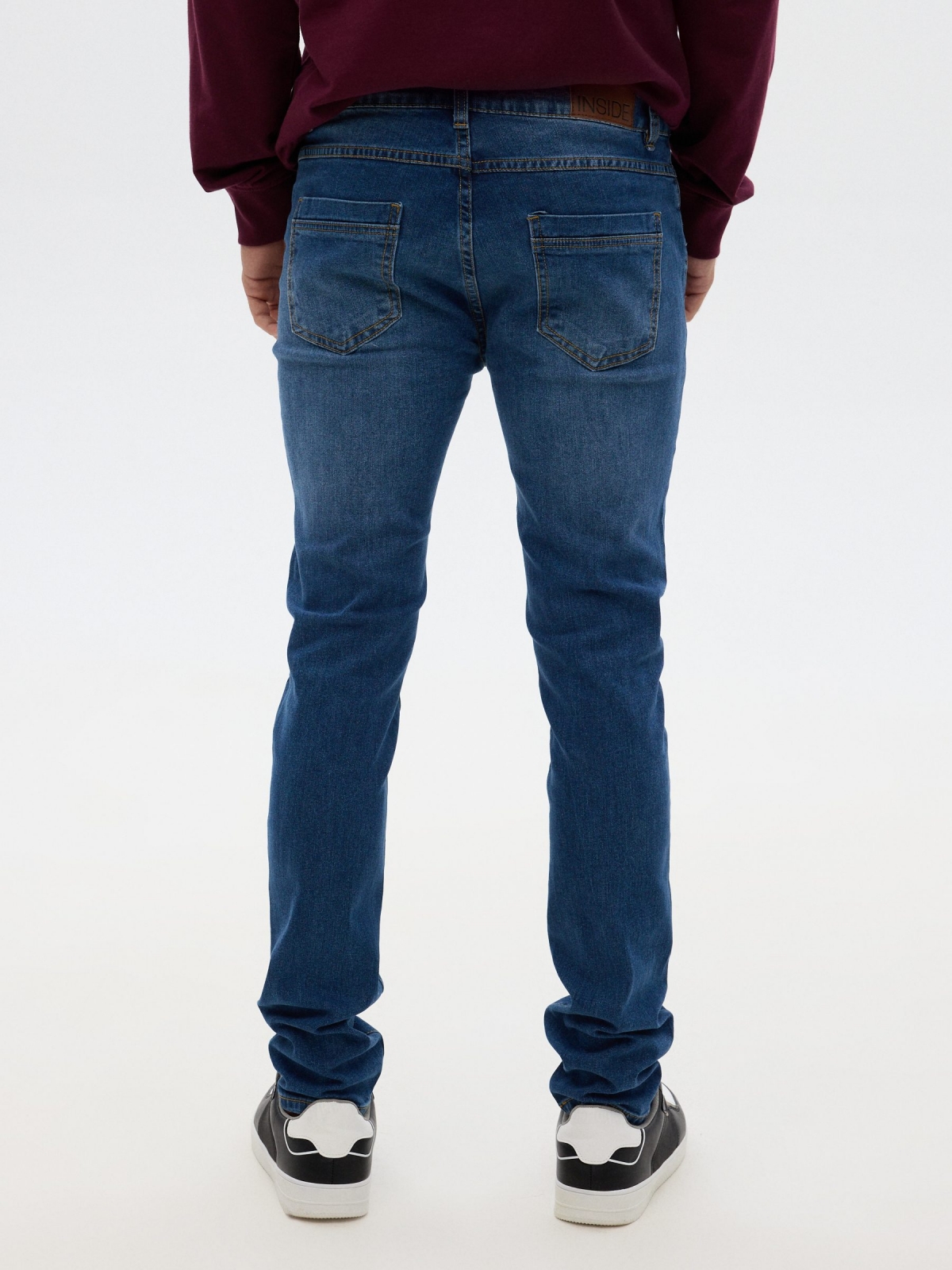 Jeans super slim azul vista media trasera