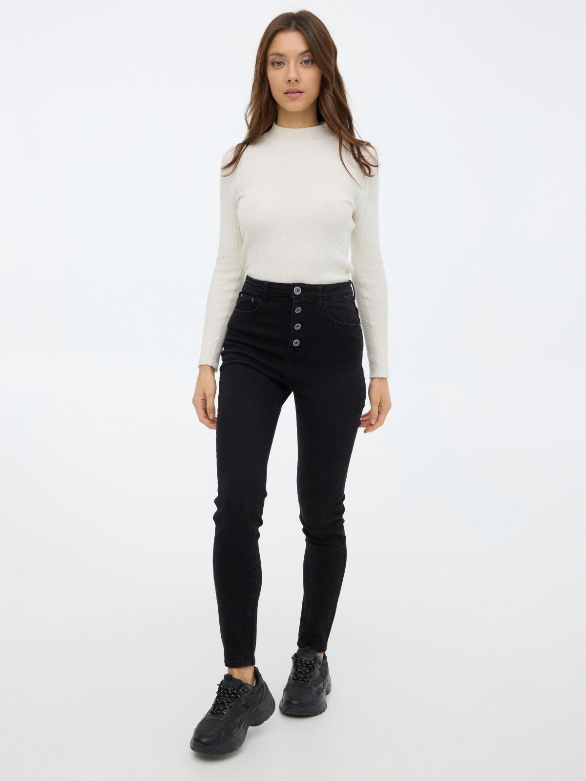Skinny pants with buttons black front view