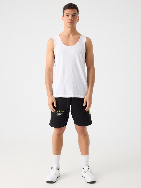 Combined bermuda jogger short with text black front view