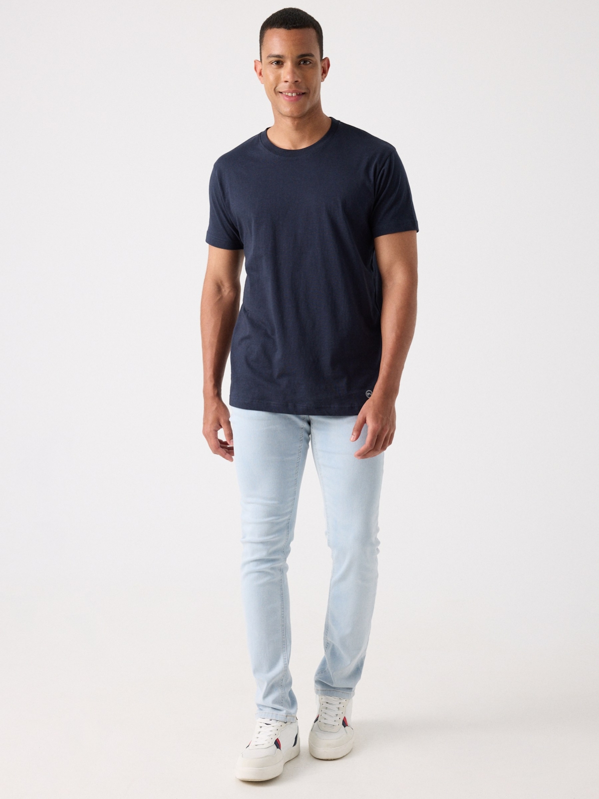 Jeans slim branqueado azul/branco vista geral frontal