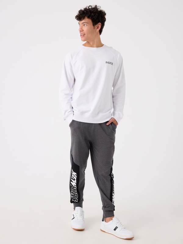 New York print joggers grey front view