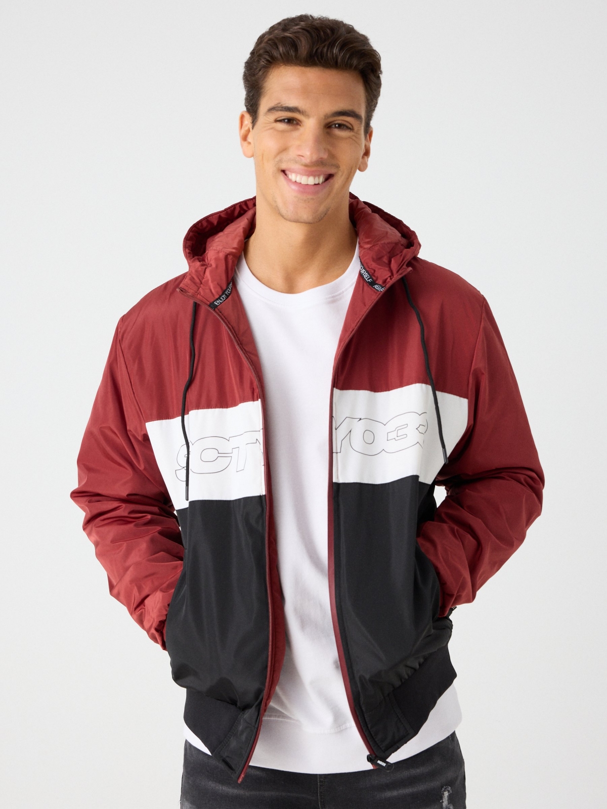 Quilted color block jacket with text red middle front view