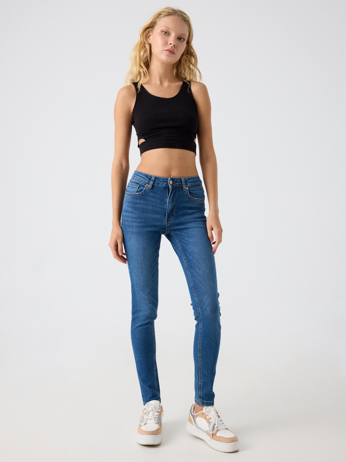 Mid-rise skinny jeans with washed effect ducat blue front view