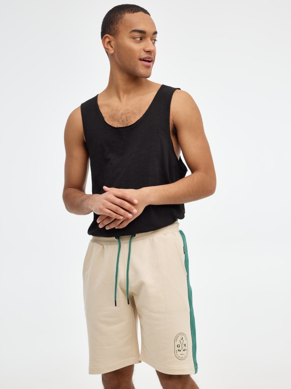 Bermuda jogger shorts with side bands sand middle front view