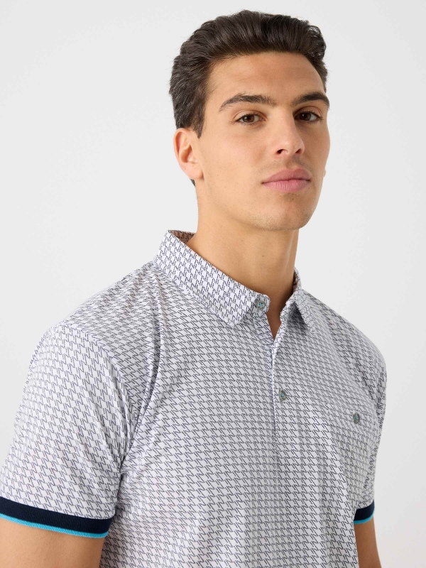Printed polo shirt with button pocket navy detail view