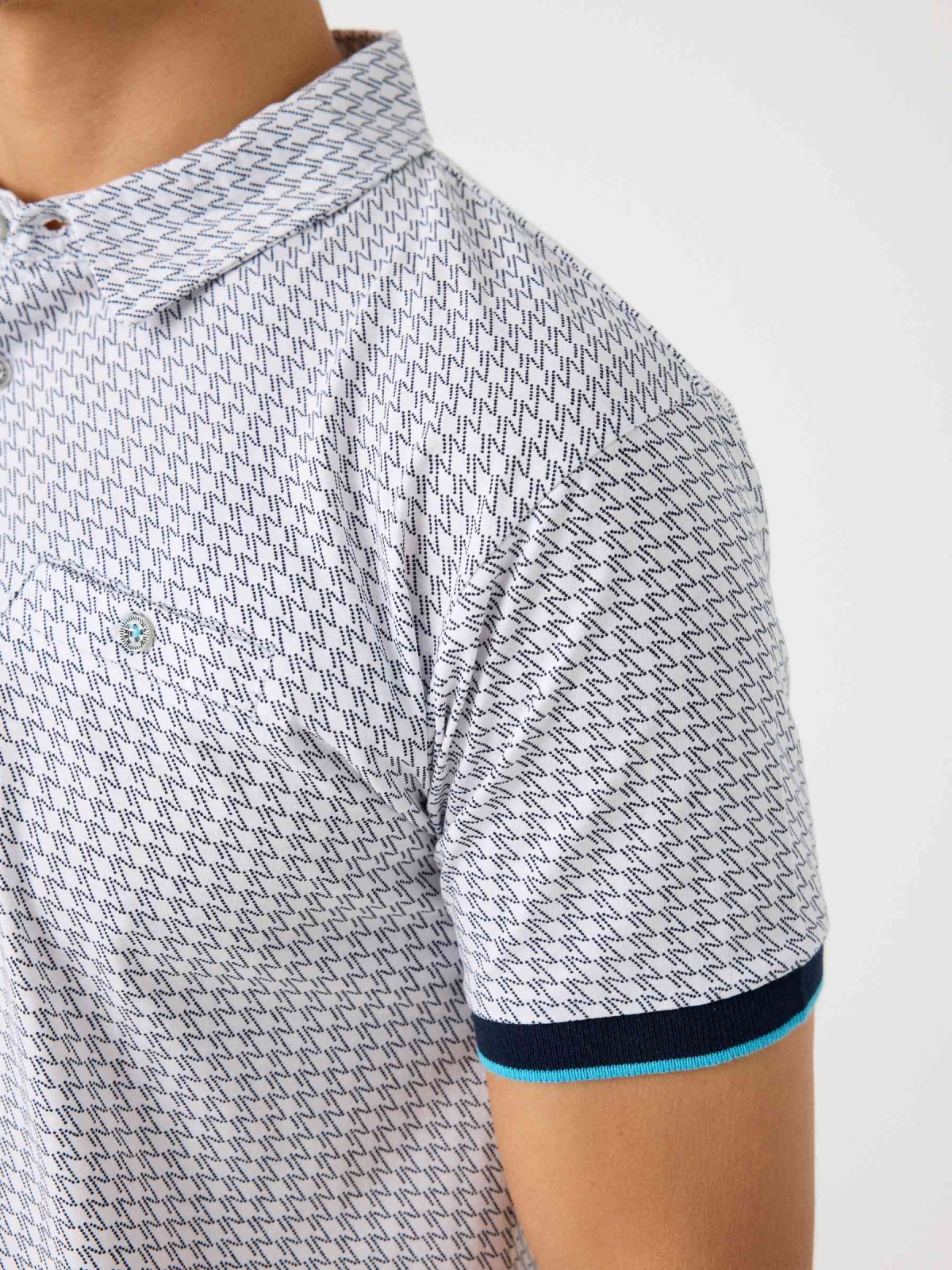 Printed polo shirt with button pocket navy detail view