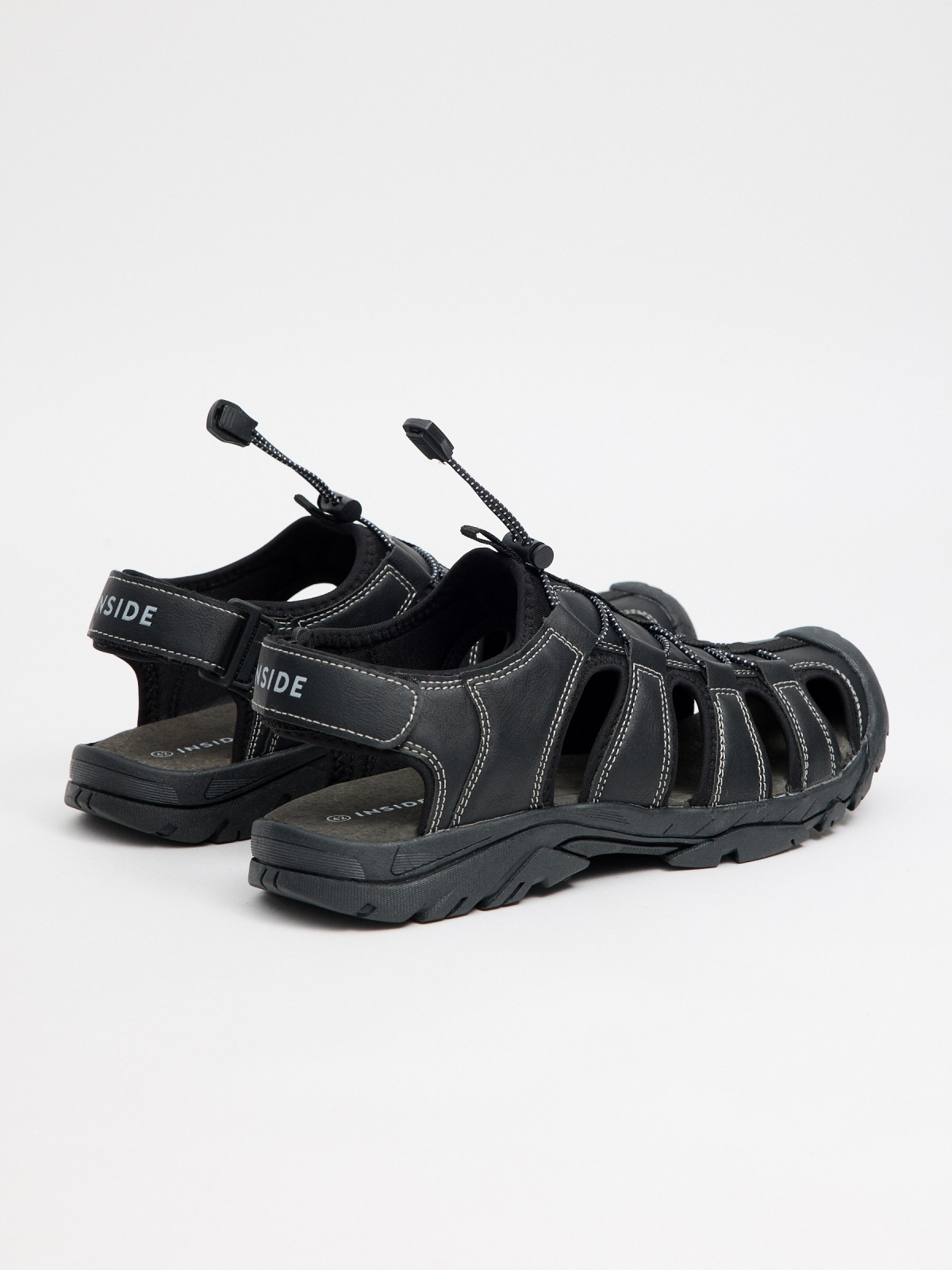 Leather-effect crab sandals black 45º back view
