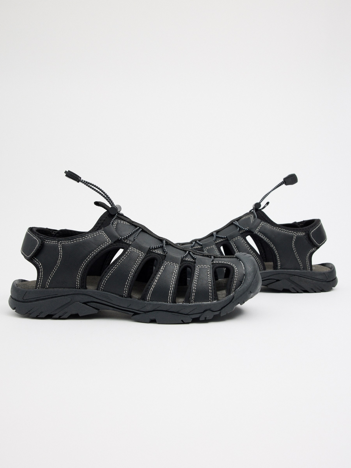 Leather-effect crab sandals black detail view