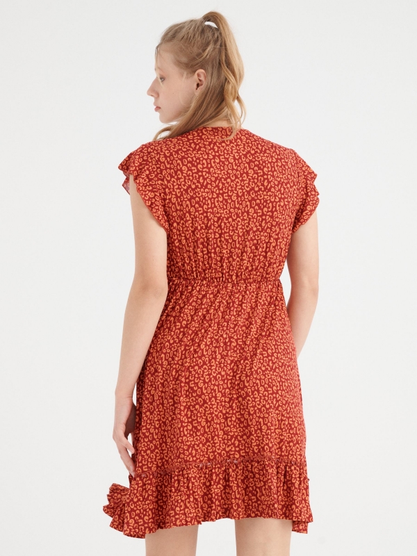 Animal print ruffled dress brick red middle back view