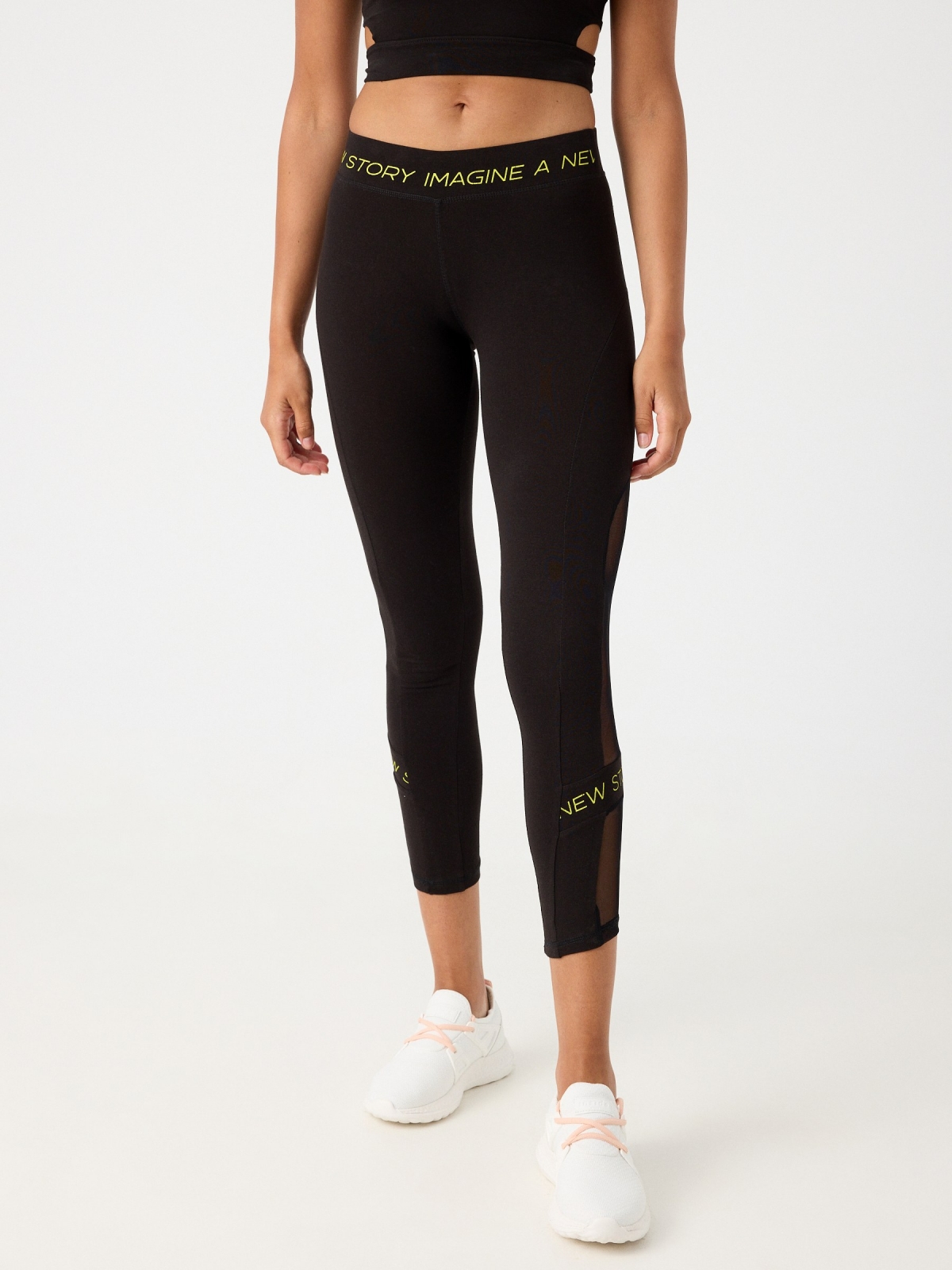 Neon text leggings black middle front view