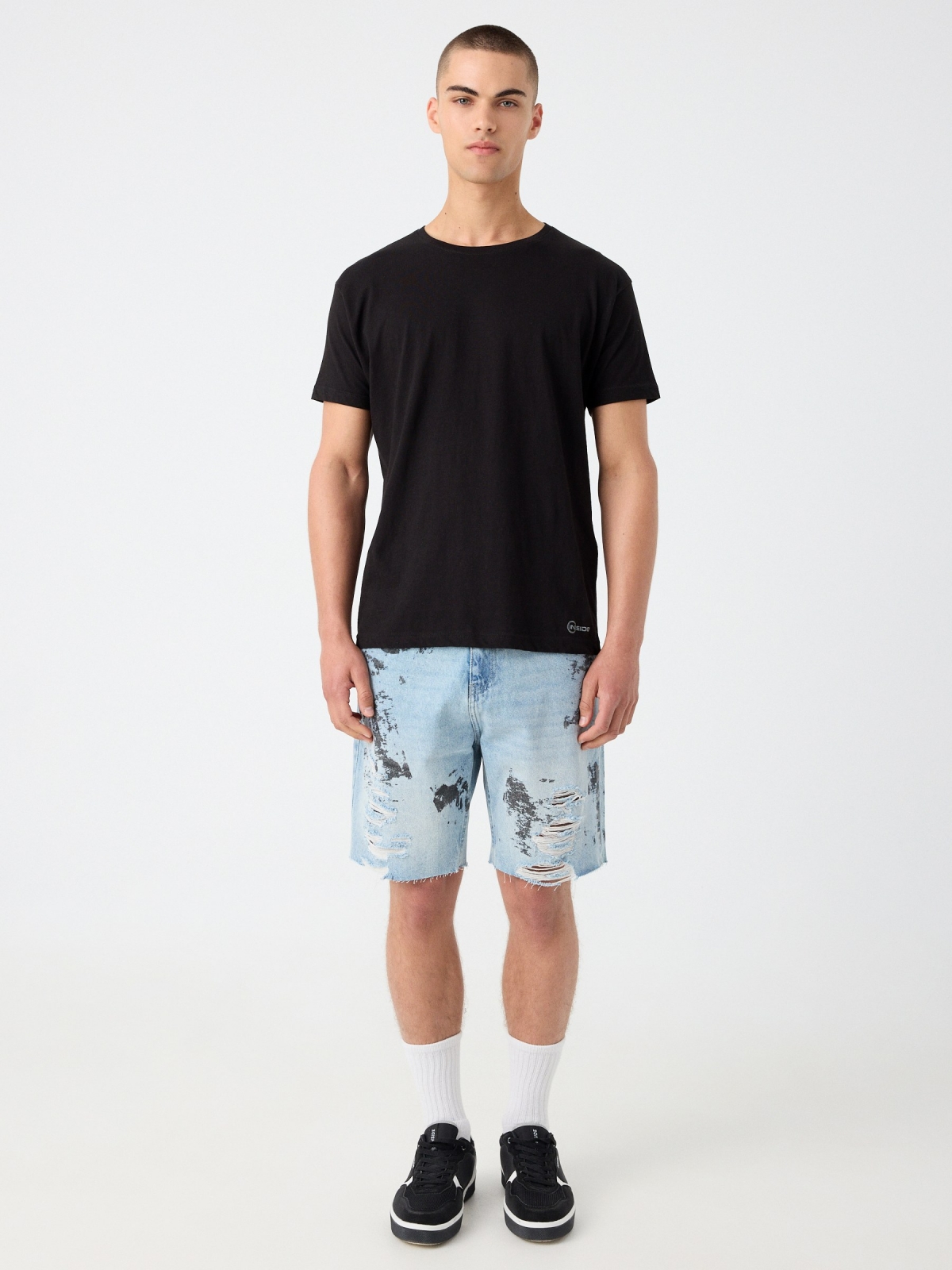 Ripped worn-effect denim bermuda shorts light blue front view