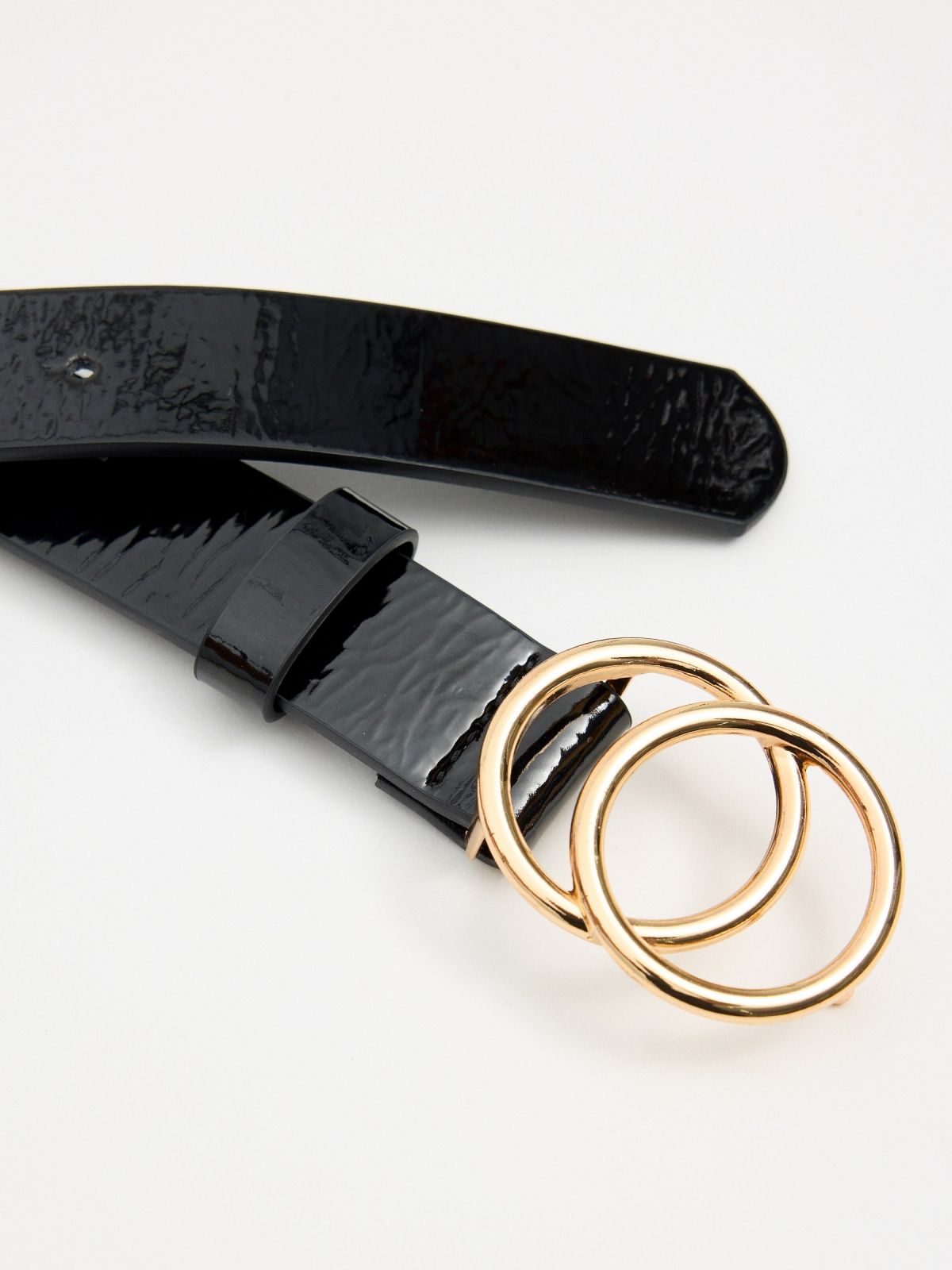 Patent leather belt with gold buckle black detail view