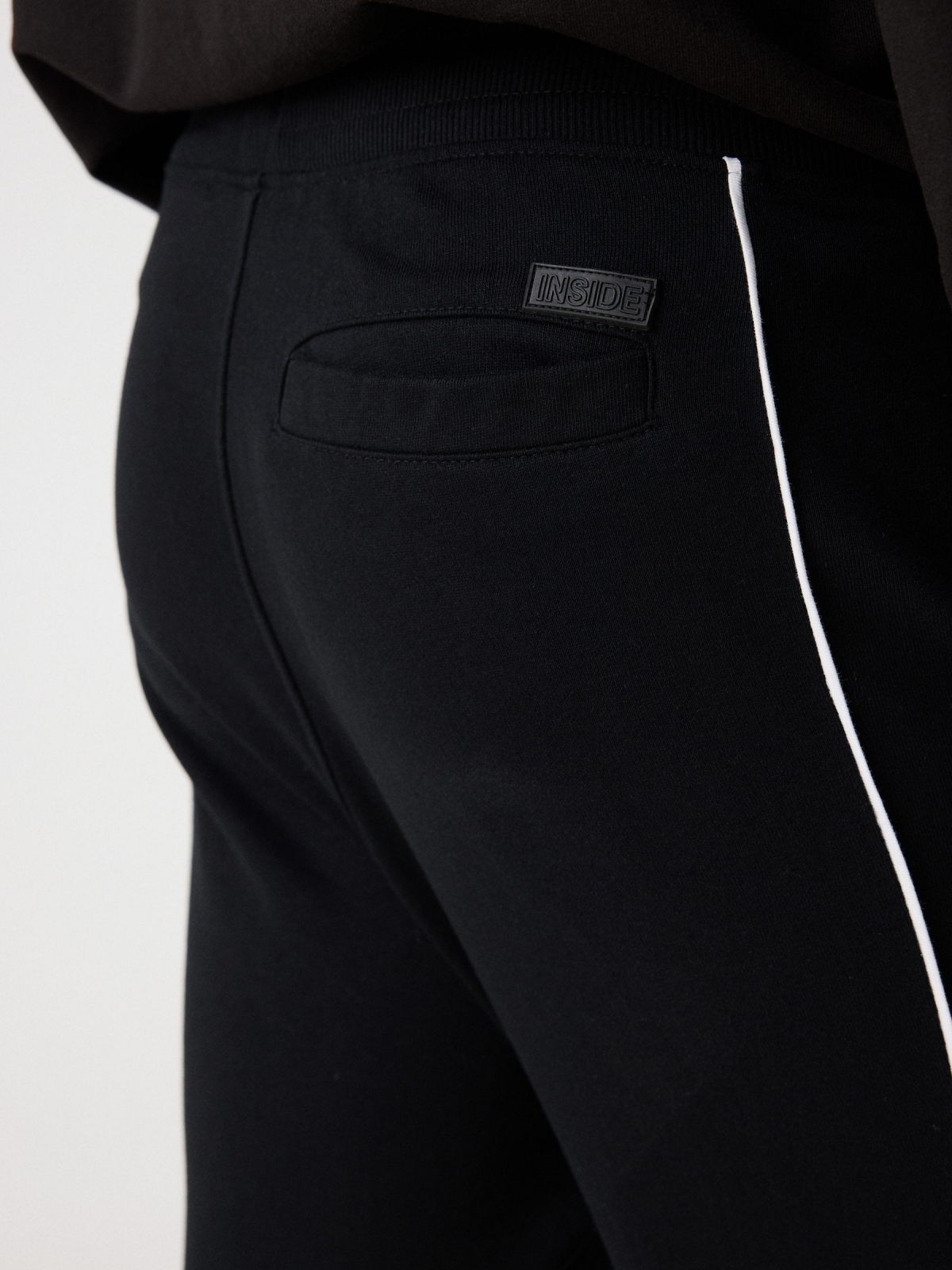 Jogger pants with mixed details black detail view