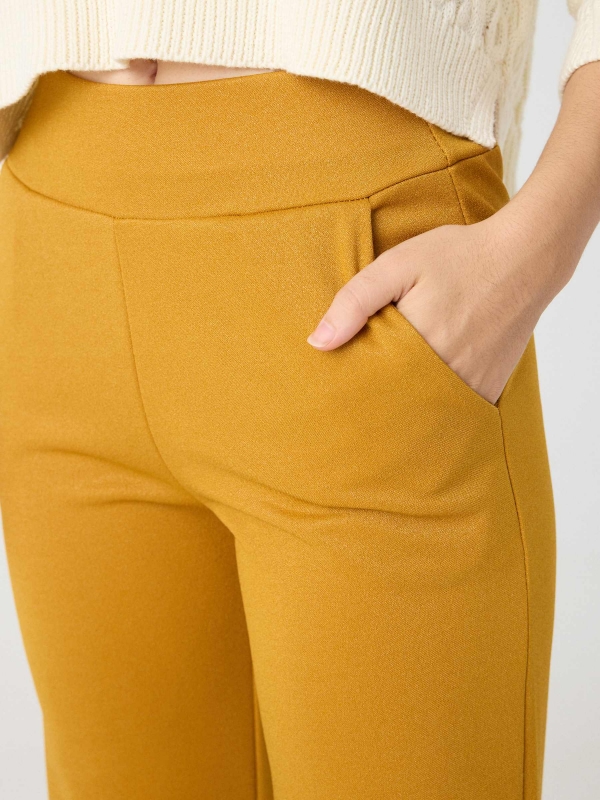 Flare lurex pants mustard detail view